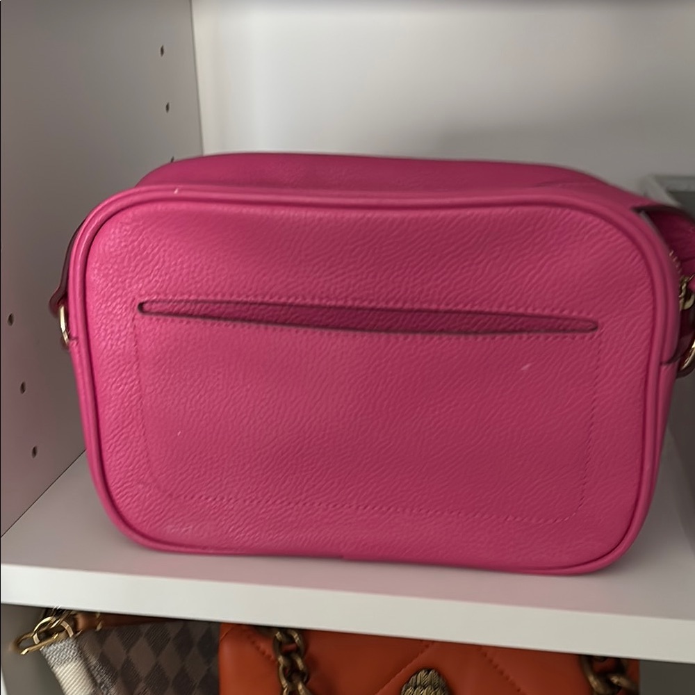 Fuchsia Crossbody Bag with Durable Synthetic Material and Zipper Closure